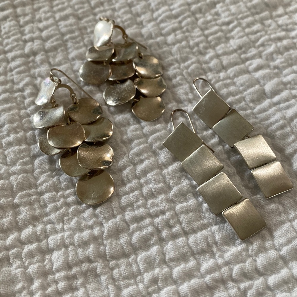 Dangly silver-toned earrings in two designs